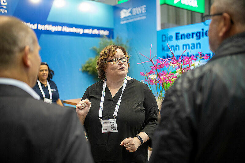 Begrüßung von Neumitgliedern am BWE-Messestand Begrüßung von Neumitgliedern am BWE-Messestand